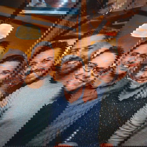 males in a bar having fun